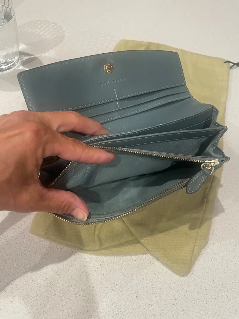 Burberry leather printed continental wallet with blue flap